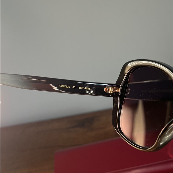 Gucci Women's Black Sunglasses with Gold Accents - Picture 6 of 10